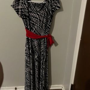 Black and white dress with red sash